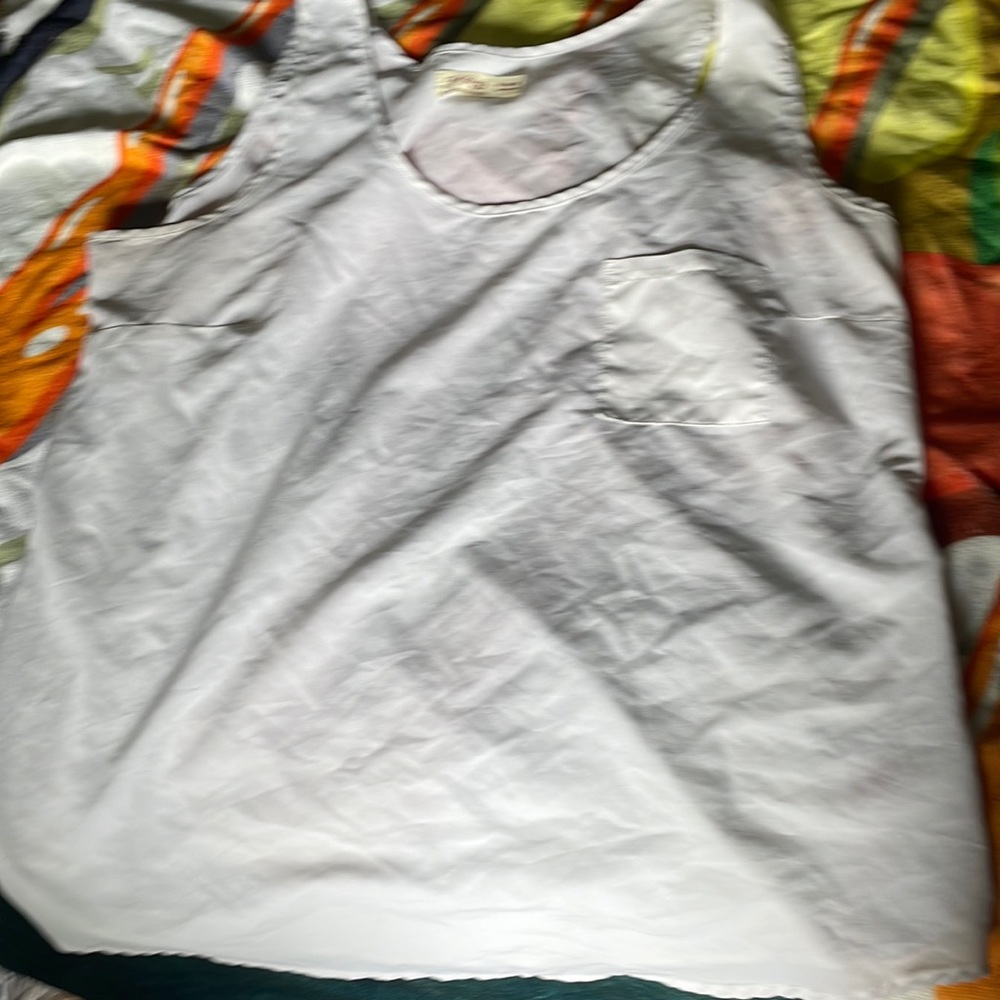 White tank top with pocket.